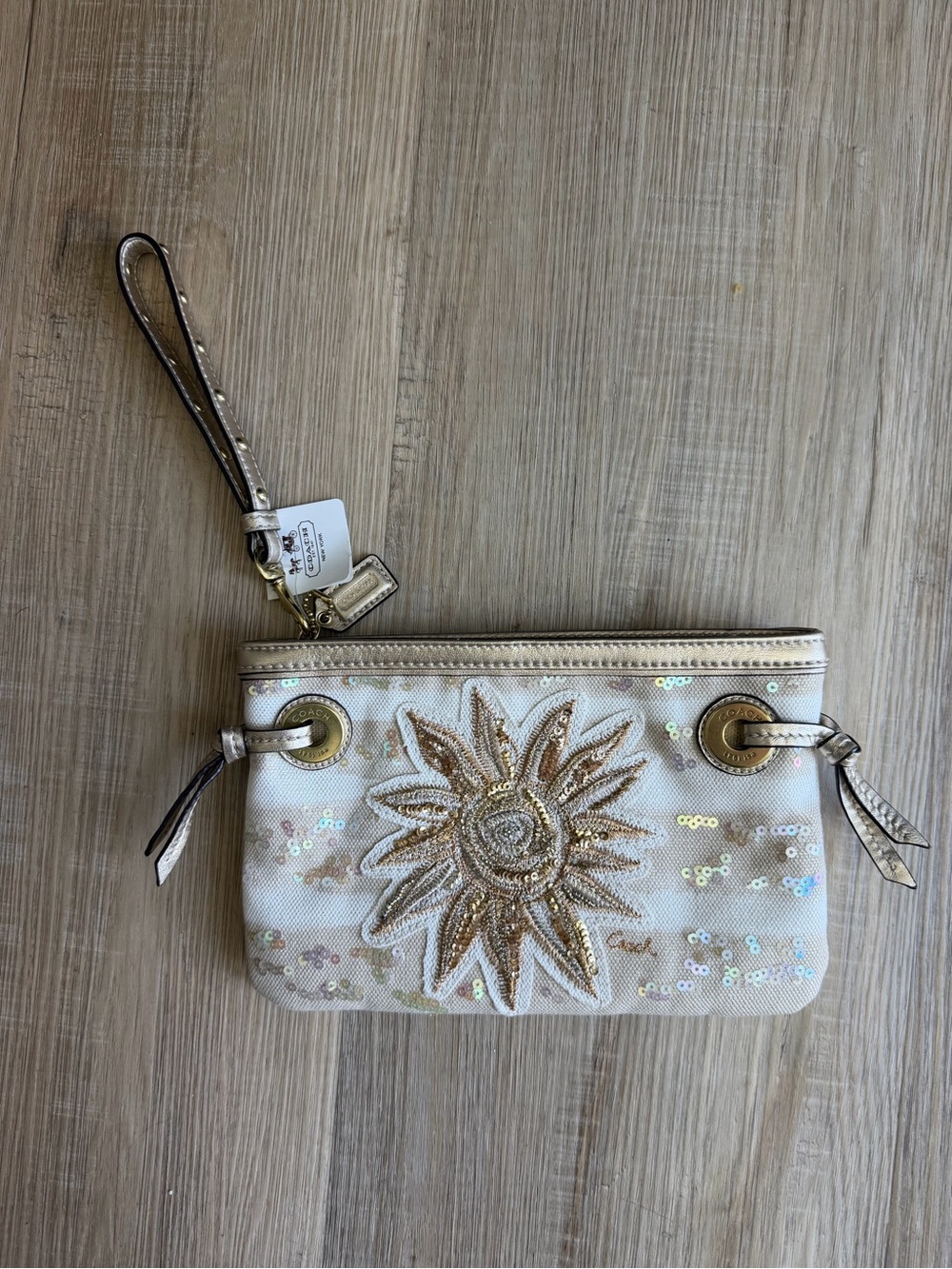Coach Cream and Metallic Gold Sequin Wristlet